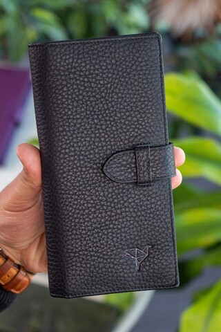 Portofel, Albert, Garbalia