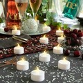 Set 12 lumanari LED tip pastile, Tealight Romandle, InnovaGoods, cu baterii, 70-75 h, Ø3.7 x 3.5 cm, alb