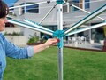 Uscator rotativ Leifheit, Linomatic 500 Easy, 50 m capacitate de uscare, aluminiu/plastic, argintiu/turcoaz